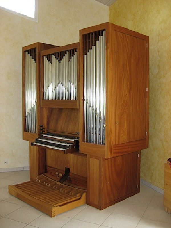 Jan en Peter van den Heuvel in 1986 op de orgelbank van het orgel voor Angoulème.
